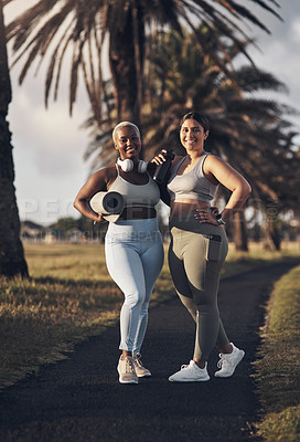 Buy stock photo Shot of two friends out for a workout together