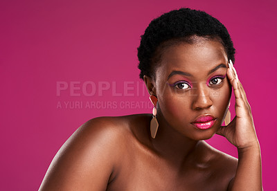 Buy stock photo Studio shot of a beautiful young woman posing against a pink background