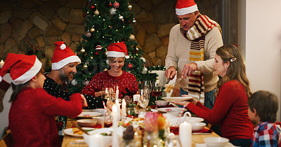 Buy stock photo Christmas, dinner or family eating food in home on holiday together for bonding in social gathering. Mother, father or happy grandparents sharing feast with smile to enjoy meal with kids at night