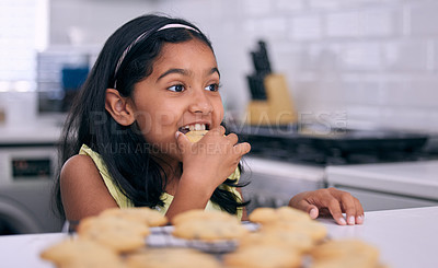 Buy stock photo Girl, cookies and snack for bite in kitchen, hungry and organic biscuit or cake in home. Female person, kid and nutrition in childhood for dessert, eating and fresh treat on diet or healthy food