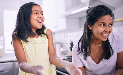 Buy stock photo Girl, mother and play with flour or laugh in kitchen, baking and fun with ingredients in home. Daughter, mommy and bonding or Indian family for cookies preparation, childhood and learning pastry