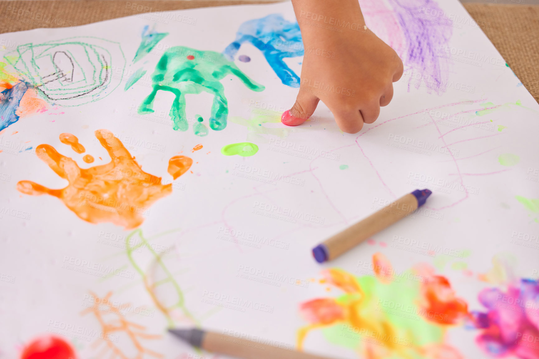 Buy stock photo Paper, hand and child painting on floor for classroom, art and learning creative expression at kindergarten. Education, color and kid with drawing, sketch or artistic shape, handprint or canvas fun