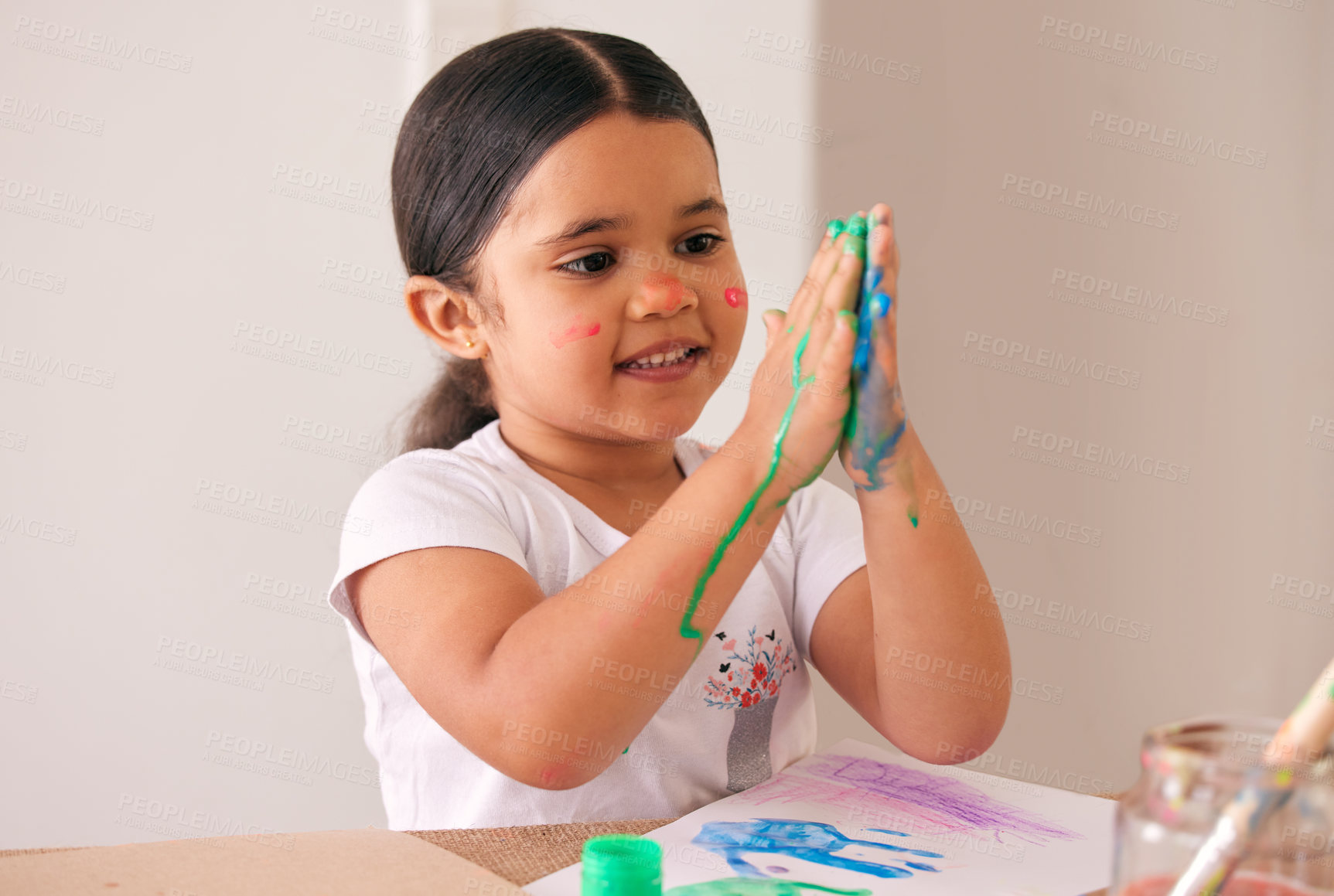 Buy stock photo Painting hands, mess and happy child with art, home and learning creative expression at kindergarten. Education, color or Mexican kid with craft, splash or artistic shape, handprint or canvas fun