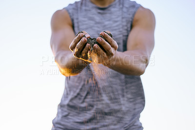 Buy stock photo Strong male farmer holding nature soil. Close up of man on an outdoor journey nurturing, caring for the environment. Guy with hands of soil ready for farming natural life during sunrise 