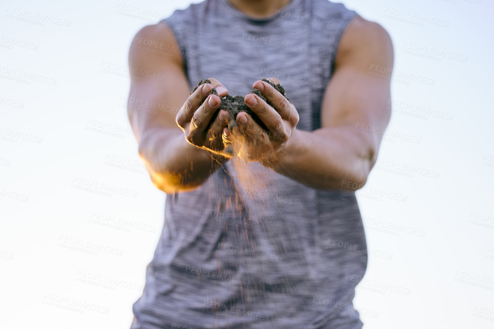 Buy stock photo Strong male farmer holding nature soil. Close up of man on an outdoor journey nurturing, caring for the environment. Guy with hands of soil ready for farming natural life during sunrise 