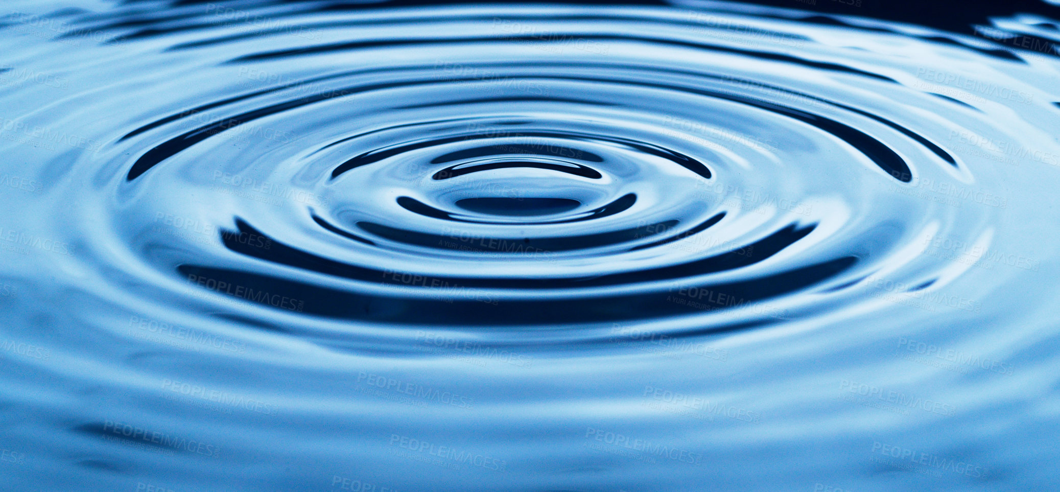 Buy stock photo Abstract studio shot of ripples in a puddle of water