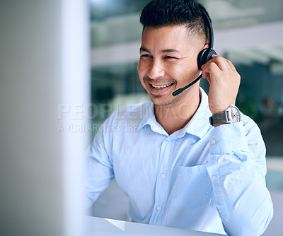 Buy stock photo Smile, telemarketing and Asian man with headphones, call center and communication with help, advice and connection. Male person, employee and agent in a modern office, headset and customer service