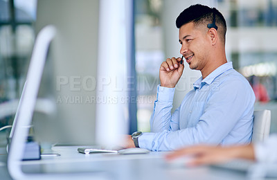Buy stock photo Man, phone call and callcenter worker for telecom, communication and contact us with CRM. Happy working at telemarketing agency, sales and headset with mic for help desk, customer service and support