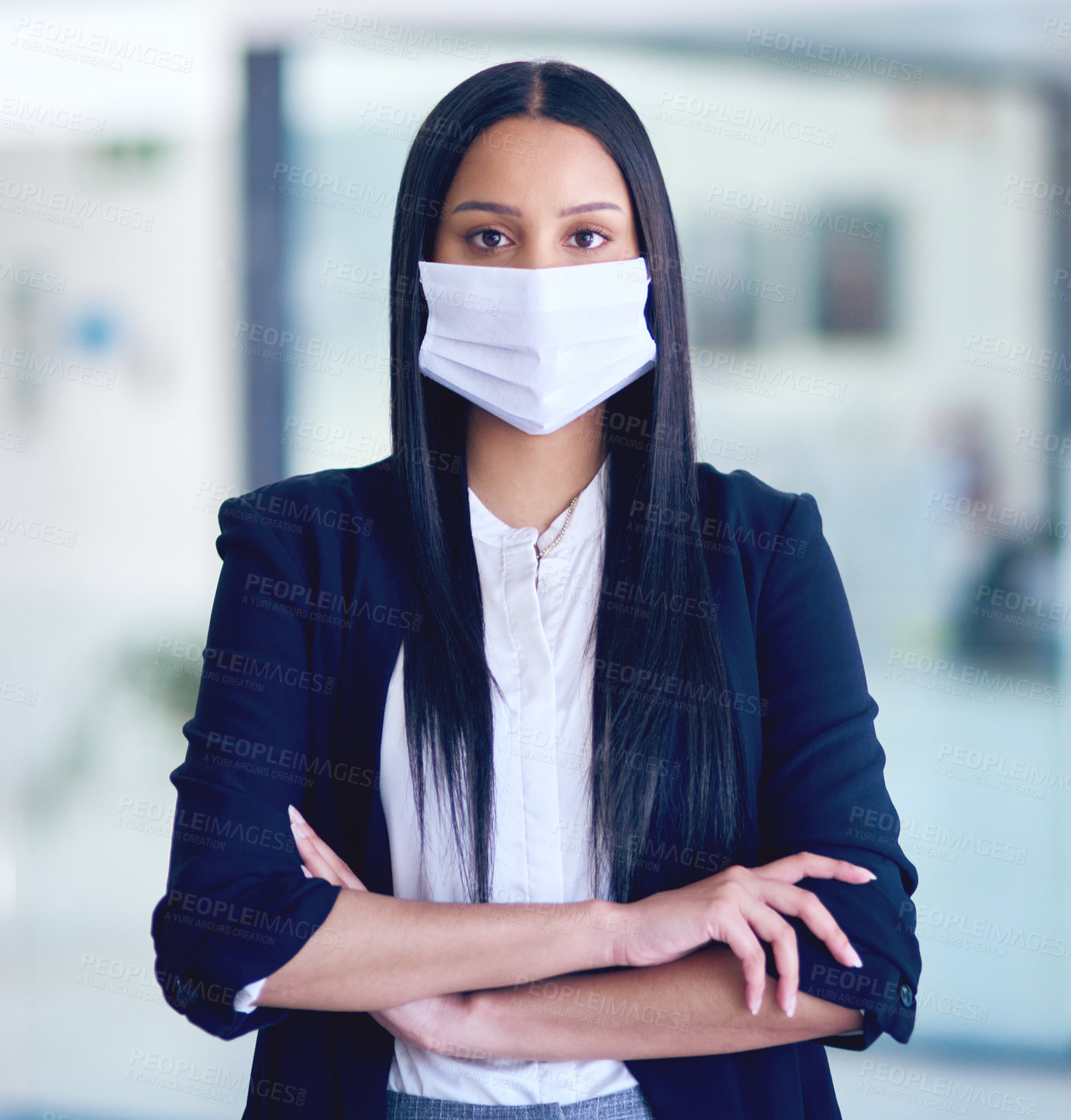 Buy stock photo Business woman, face mask portrait and arms crossed with company attorney and serious. Worker, young female employee and professional lawyer in law firm at office with modern office and safety