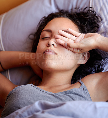 Buy stock photo Cropped shot of a woman touching her face while waking up