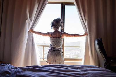 Buy stock photo Morning, bedroom and woman opening curtain for sunshine, fresh air getting ready for new day. Relax, wake up and female person at window with light, peace and thinking with view at home from back