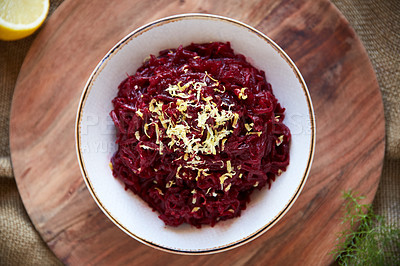 Buy stock photo Overhead shot of a roasted beetroot salad in a white serving bowl