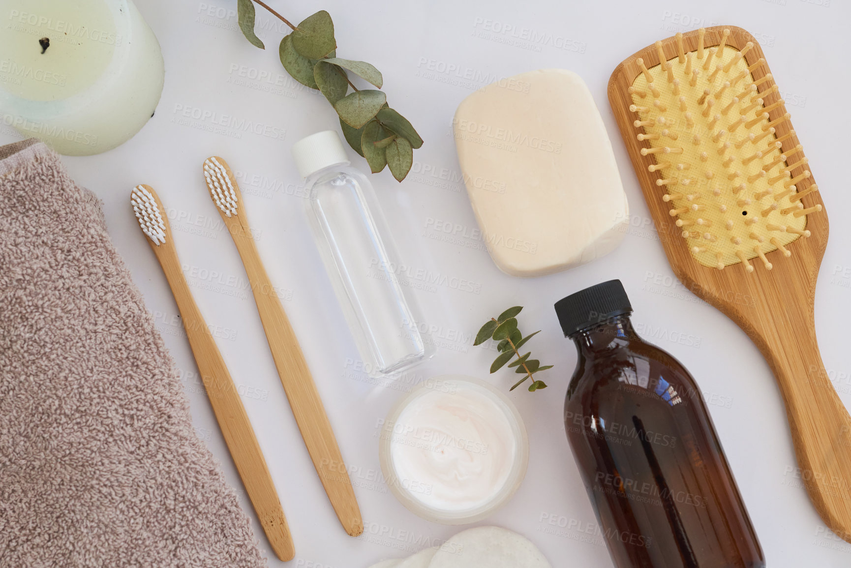 Buy stock photo Overhead shot of various body care essentials on a white background