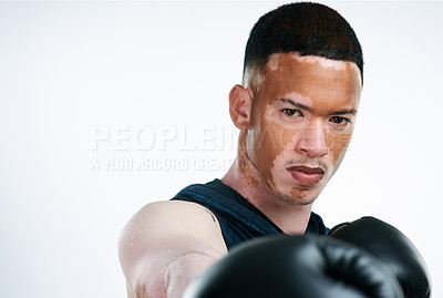 Buy stock photo Man with vitiligo, portrait and boxer with gloves for fight, tournament or boxing match on a white studio background. Face of male person or fighter ready for self defense, MMA or competition mockup