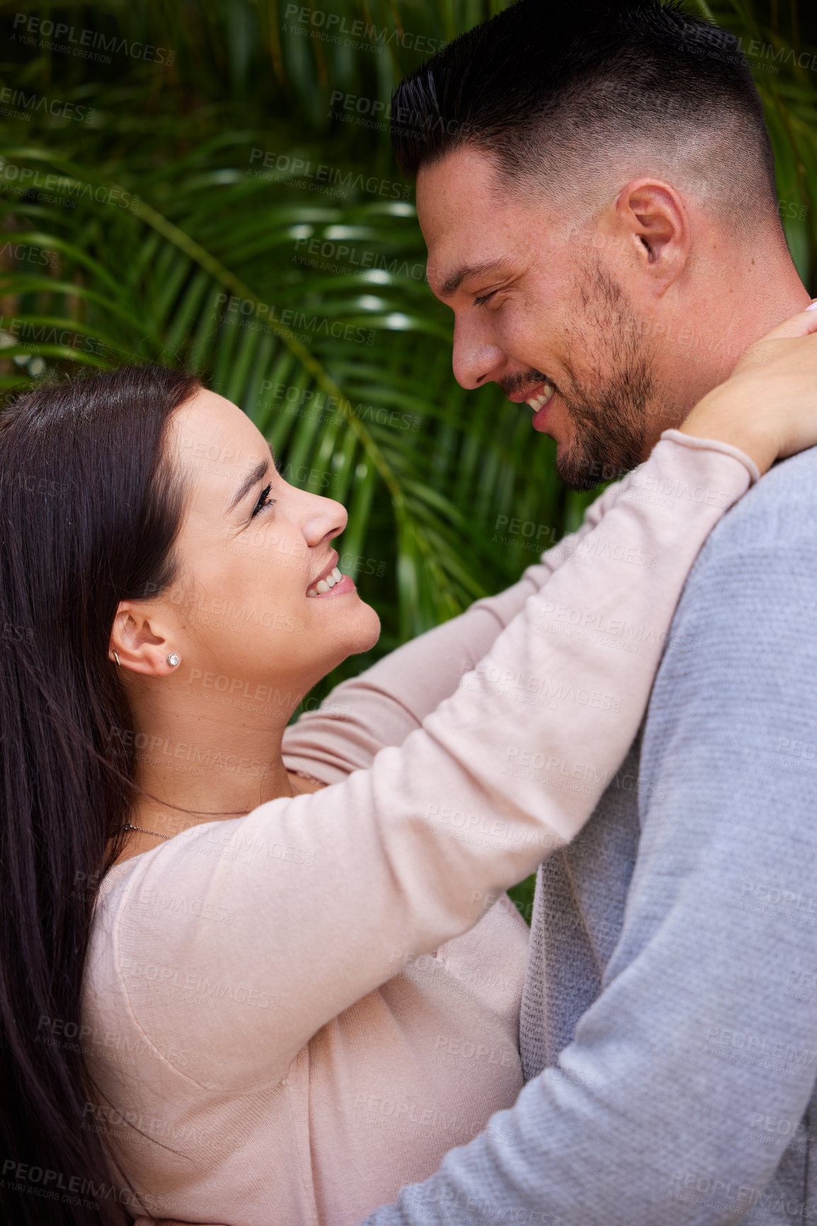 Buy stock photo Happy couple, hug and affection with love for care, support or romance together in nature. Man, woman or lovers with smile in happiness for embrace, date or relationship on holiday at outdoor park