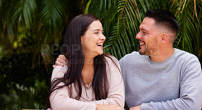 Buy stock photo Cropped shot of an affectionate laughing while sitting together outside