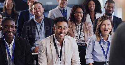 Buy stock photo Shot of a group of businesspeople attending a conference