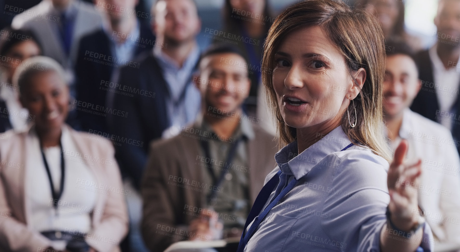 Buy stock photo Business woman, presentation and a speaker with audience at a seminar, workshop or training. Portrait of a presenter speaking to diversity men and women crowd at a conference for corporate education 