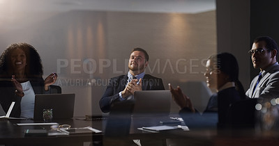 Buy stock photo Shot of a group of businesspeople clapping during a meeting in a boardroom