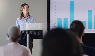 Buy stock photo Woman speaker, conference and business graphs at a seminar, workshop or training. Professional men and women at a presentation with a podium for learning, knowledge and discussion for sales growth