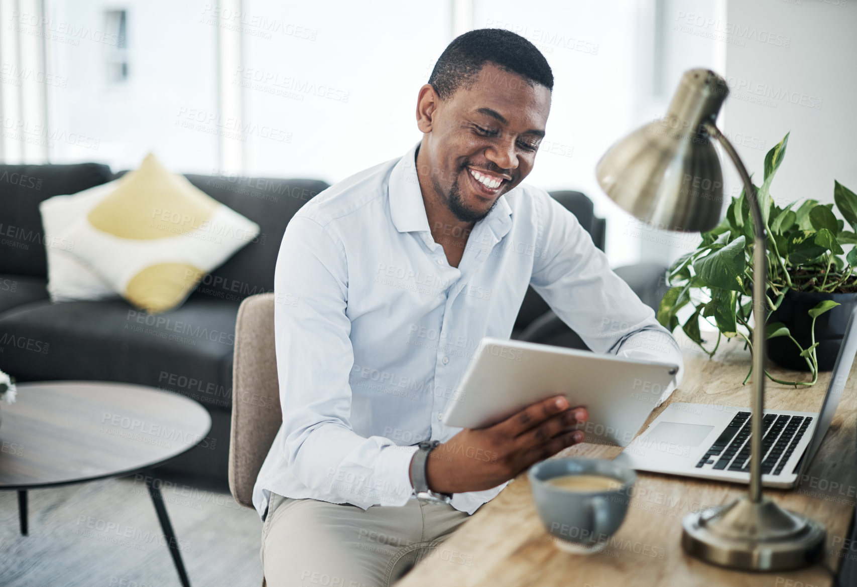 Buy stock photo Black man, tablet and happy in house for remote work, communication and business email with coffee. Human resources, technology and smile for freelance job, social networking and talent acquisition