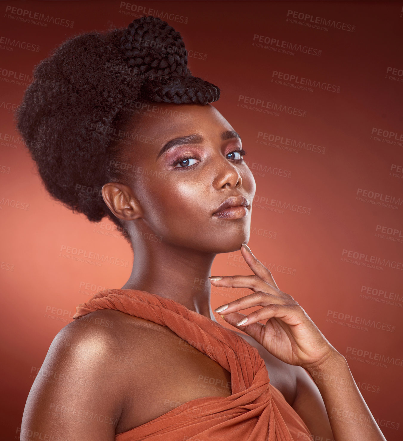 Buy stock photo Black woman, beauty and studio in portrait with makeup for aesthetics, fashionable with foundation for facial. Female model, cosmetics and red background for skin with clothes for expression in Ghana