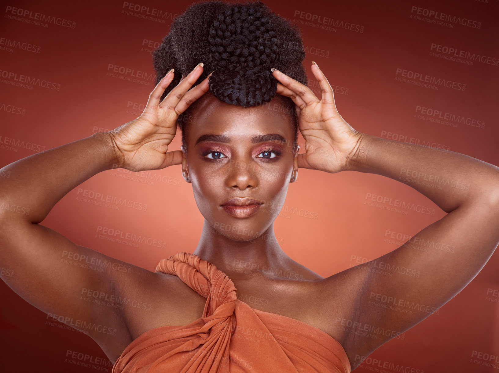 Buy stock photo Hairstyle, confidence and portrait of African woman in studio for pride, culture and braids with hands and healthy texture. Black female person, self care and heritage of hair for shine and glow