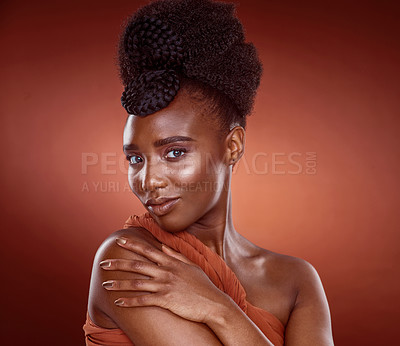 Buy stock photo Black woman, portrait and makeup with confident in studio for beauty or glamour by red background. Pride, African and female person and cosmetic with foundation for glow or shine as model in Nigeria