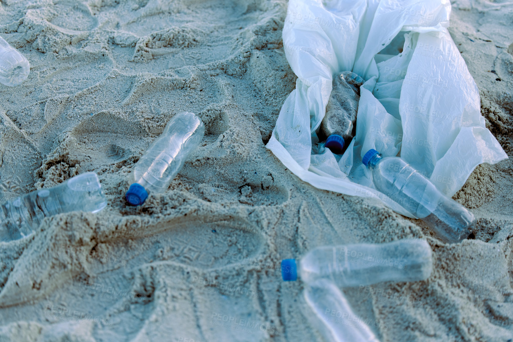 Buy stock photo Plastic bottle, rubbish or recycling on sand pollution for clean up, waste management and environmental awareness. Garbage, trash or litter on beach for sustainability, eco friendly or conservation