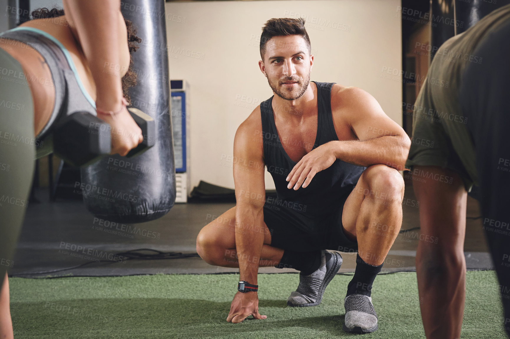Buy stock photo Fitness, people and personal trainer with kettlebell in gym for workout, muscle strength and exercise. Sports, health class and person with weights for bodybuilder training, challenge and strong arms