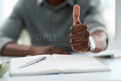 Buy stock photo Man, hands and notebook with thumbs up for winning, achievement or good job on office desk. Hand of male person with book in planning showing thumb emoji, yes sign or like for approval at workplace