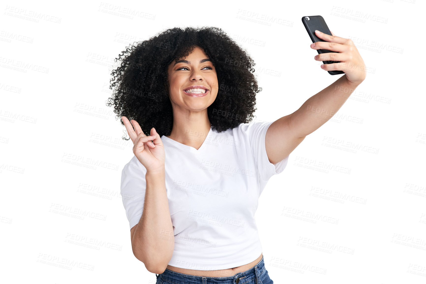Buy stock photo Studio shot of an attractive young woman using a smartphone to take selfies against a white background