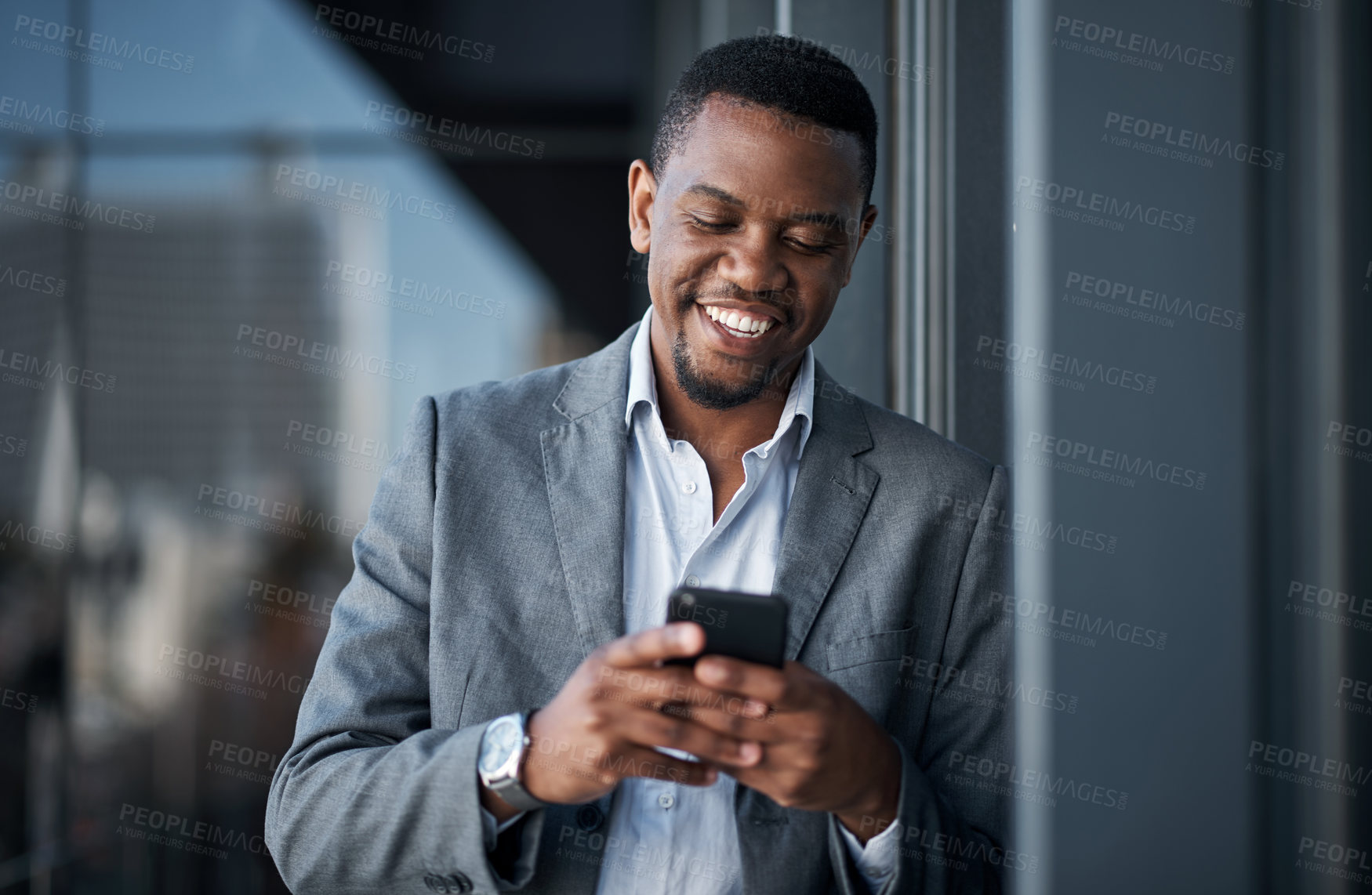 Buy stock photo Black man, phone and happy in office for professional career, good news and business opportunity. Human resources, mobile and manager with smile for recruitment, networking and talent acquisition