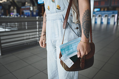 Buy stock photo Cropped shot of a woman on her way to board her flight at the airport