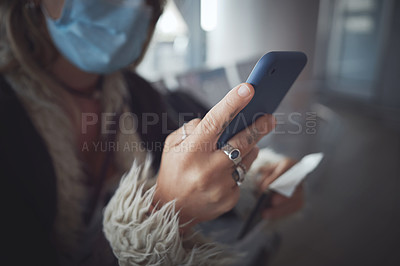 Buy stock photo Cropped shot of a woman using her phone in the airpot