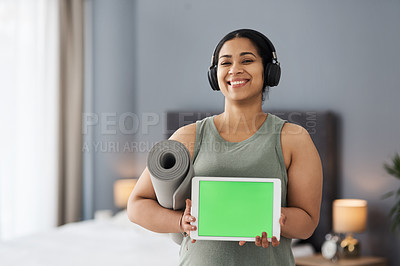 Buy stock photo Portrait of a sporty young woman holding a digital tablet with a green screen at home