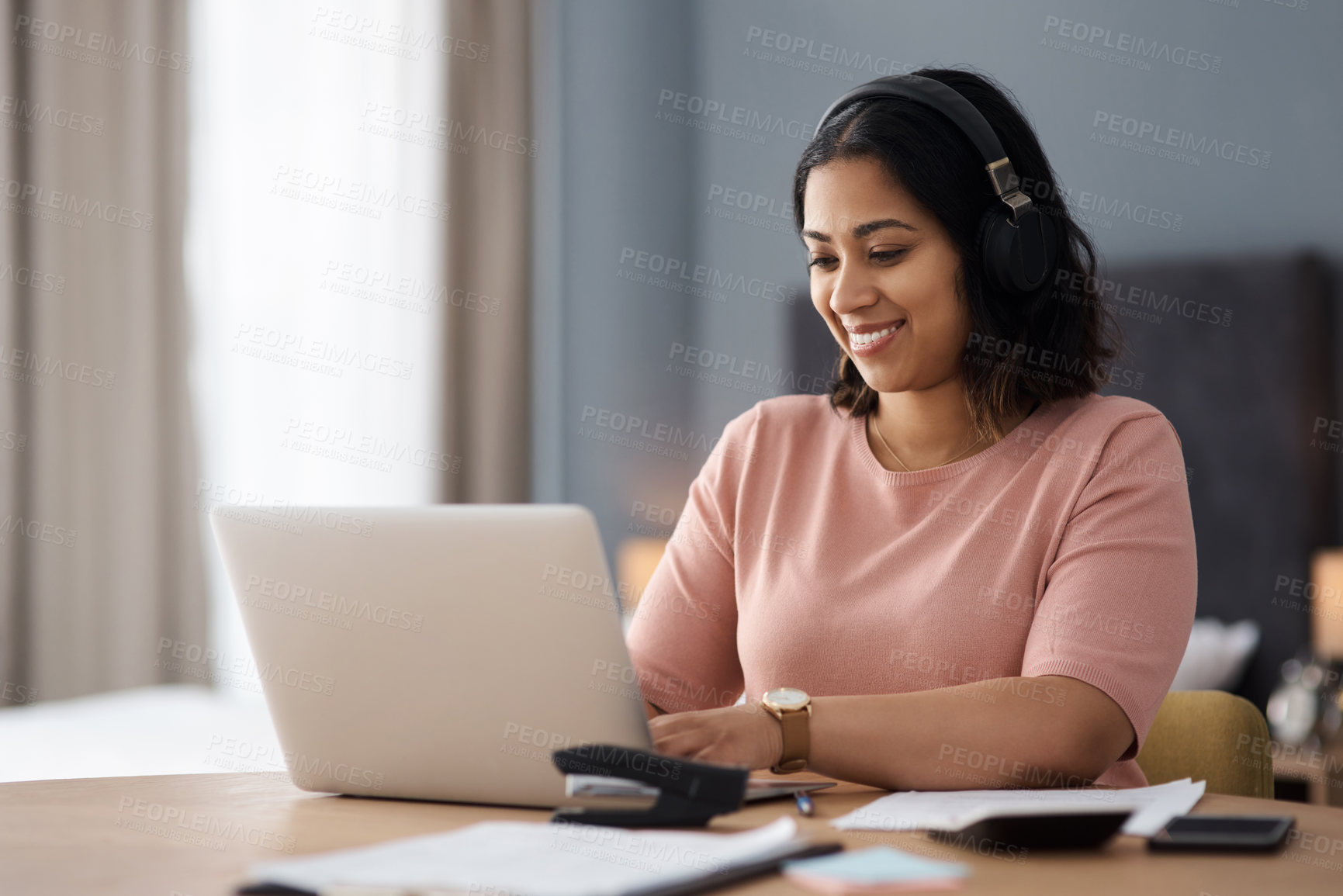 Buy stock photo Shot of a young woman working from home