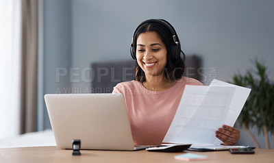 Buy stock photo Shot of a young woman working from home