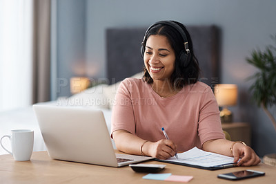 Buy stock photo Shot of a young woman working from home