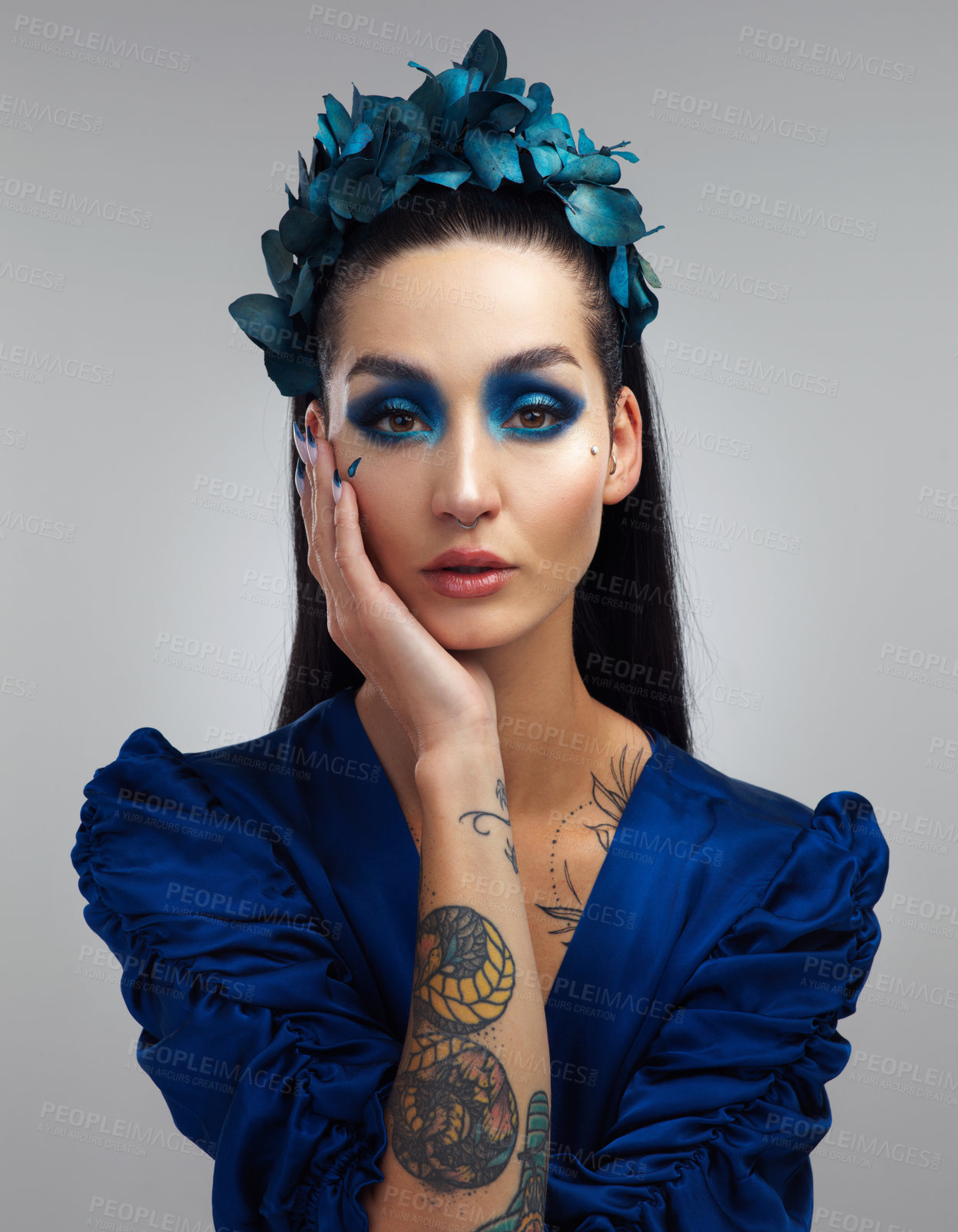 Buy stock photo Portrait, flower crown and makeup with woman in studio for natural cosmetics, sustainable fashion and beauty. Floral cosmetology, aesthetic and eco style with person on white background for design