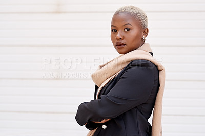 Buy stock photo Portrait of a young businesswoman standing against a white background