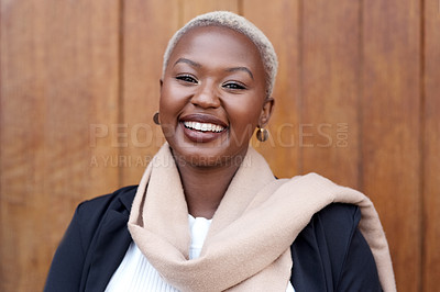 Buy stock photo Face, fashion and portrait of a happy black woman with a smile, happiness and positive mindset. Headshot of female model person with beauty laughing against a wooden wall in city for business travel