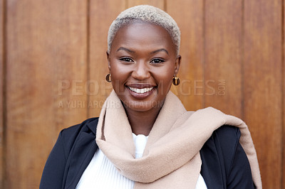 Buy stock photo Fashion, face and portrait of a black woman with a smile, happiness and positive mindset. Headshot of a happy female model person against a wooden wall outdoor in city for travel, business and beauty