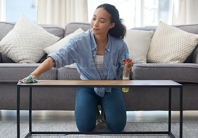 Buy stock photo Woman, cloth and cleaning home or table with detergent for dust, bacteria or dirt in living room. Happy female person or cleaner with spray bottle or product to clean wood furniture for housekeeping