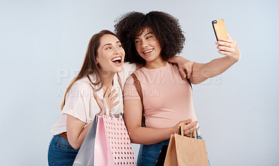 Buy stock photo Friends, women with shopping bag and happy in selfie, retail customer and fashion isolated on studio background. Excited female people smile in picture, sale and discount with promotion at boutique 