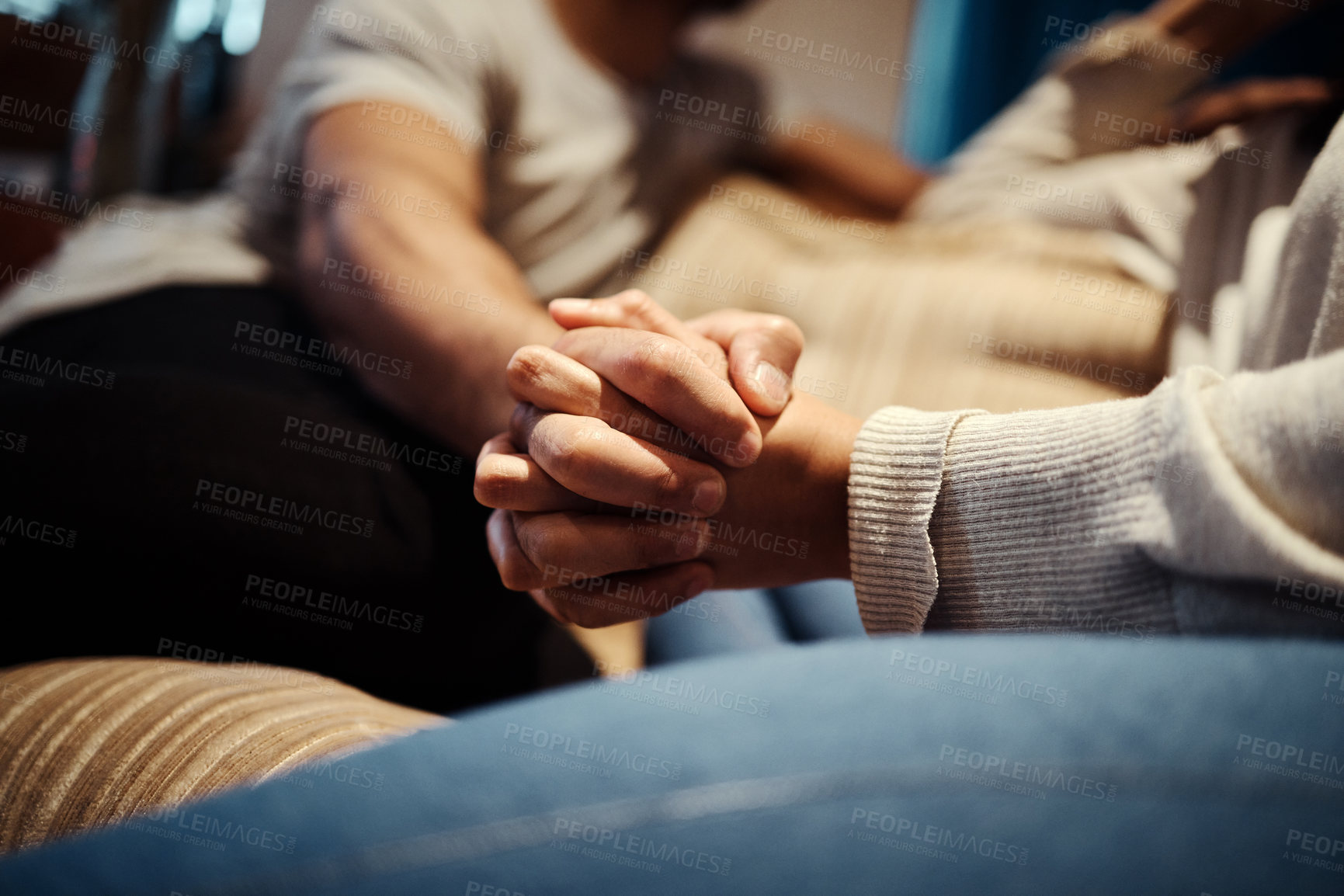 Buy stock photo Holding hands, couple and love on couch for romance, home and support or empathy in marriage. People, trust and relax on sofa and connect on date in apartment, care and kindness in relationship