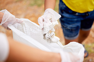 Buy stock photo Sustainability, climate change and cleaning trash at a park outdoors by volunteer with litter, pollution or plastic. Environment, earth day and charity activists recycle for the planet and community