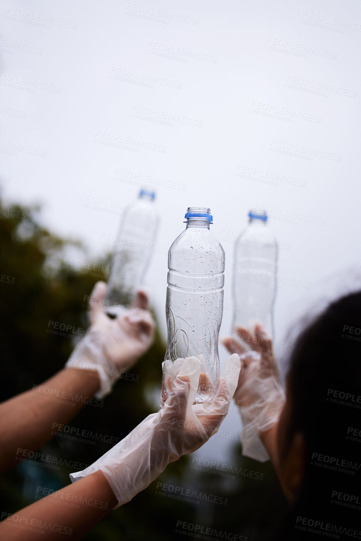Buy stock photo Bottle cleaning, sky and people hands recycle plastic garbage or pollution for volunteer environment support. Community help mockup, NGO charity or eco friendly team helping with nature park clean up