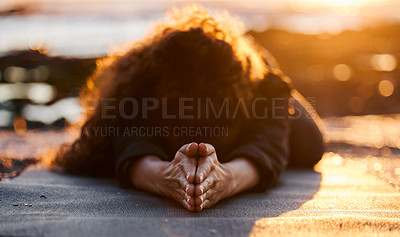 Buy stock photo Woman, beach and sunset with yoga, balasana and stretching for health, fitness and mindfulness on holiday. Girl, workout and zen meditation for peace, mindset and nature with chakra balance by ocean