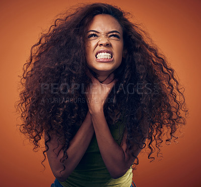 Buy stock photo Woman, hair and angry with strangle in studio on brown background for damage, treatment and bad result. Female person, isolated and upset or disappointed at style with stress, unhappy and frustrated